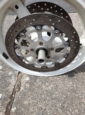 Suzuki TLR front brake discs. OEM pair. With disc bolts.