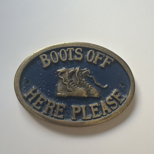 Boots off here please - here, brass