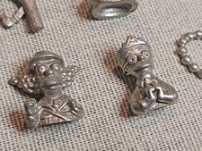 Monopoly Set; The Simpsons Metal Monopoly Counters, Full Set [12].