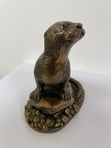 Bronze age hand cast otter - age,