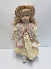 Vintage  porcelain doll with metal stand