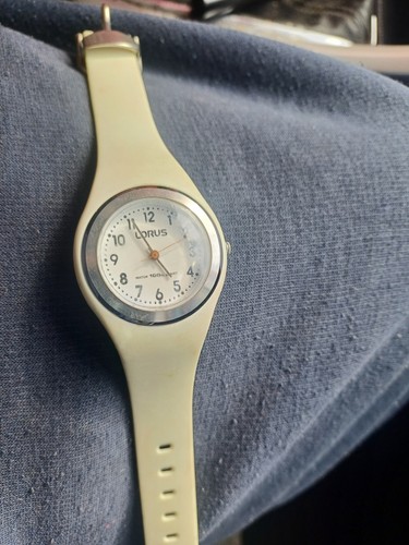 White lotus wristwatch - lotus,