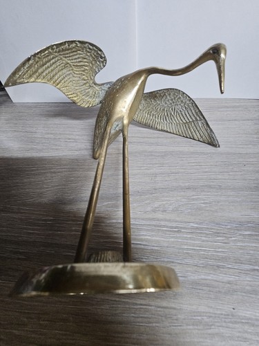 Solid brass scupture a - solid, of