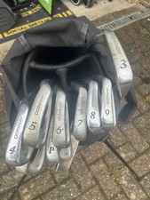 Hold Clubs And Bag