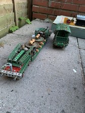 Two Meccano railway rolling