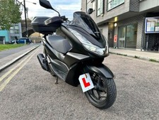 DELIVERY DRIVERS MOPED YAMAHA