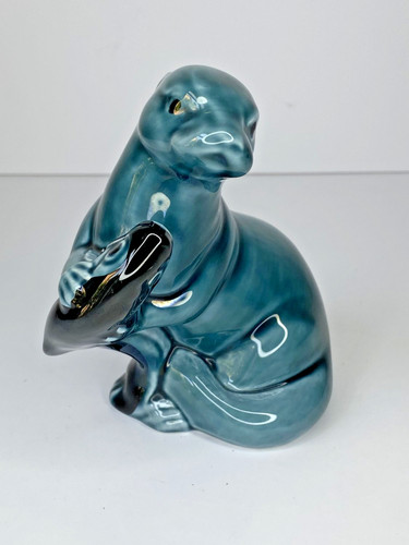 Poole pottery otter with - with, fish