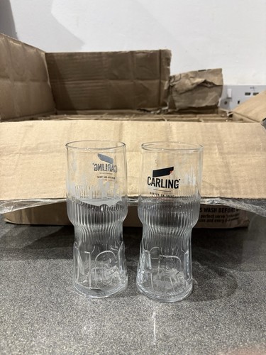 23x carling half pint glasses - carling,