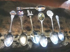 7 SILVER PL SOUVENIR SPOONS
