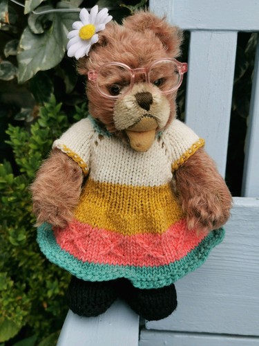 Hand knitted teddy bear