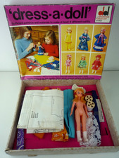 VINTAGE 1970'S DEKKERTOYS DRESS A DOLL SET WITH ORIGINAL DOLL & PATTERNS, FABRIC