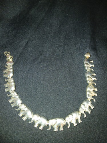 Silver tone elephant linked - silver,