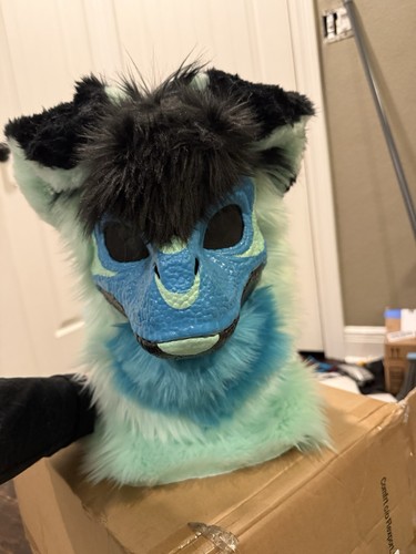 Aqua marine dinomask fursuit