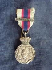 A MASONIC JEWEL ISSUED IN 1917 FOR THE GRAND MASTER'S INSTALLATION