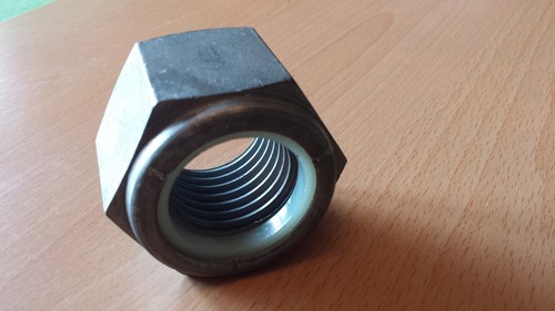 Two large nyloc nuts - 1",