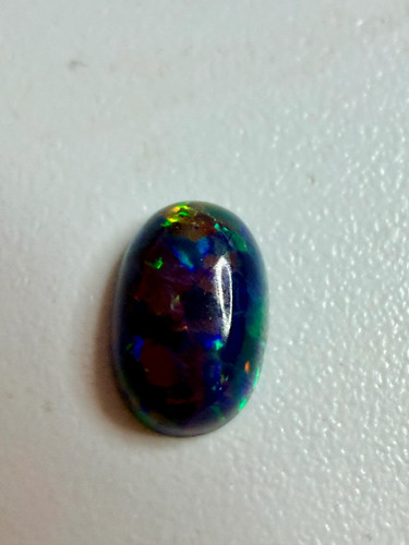 Synthetic black opal oval - synthetic,