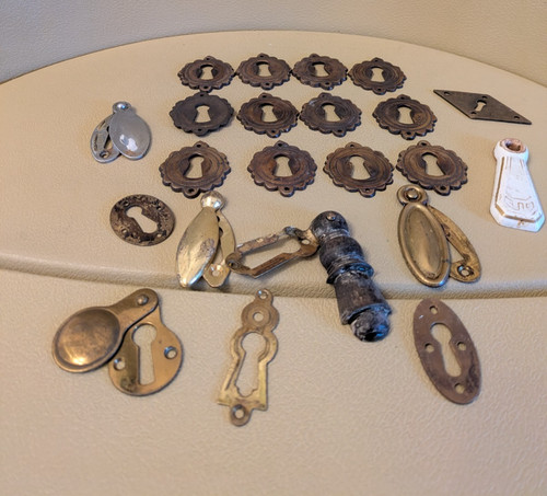Escutcheon key hole cover