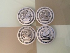 4xGENUINE VAUXHALL 60mm ALLOY WHEEL CENTRE CAPS