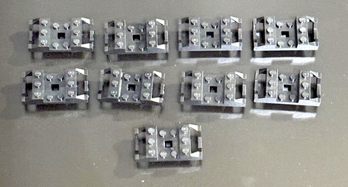 Black lego train wheel - 9,