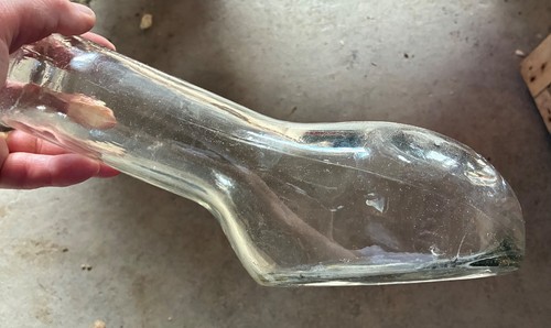 Vintage male urinal bottle