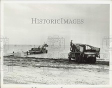 1948 Press Photo Workmen trying to raise the River Rats Barge in Florida
