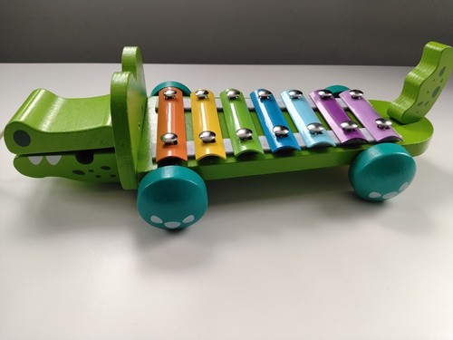 Green wooden pull along - green,