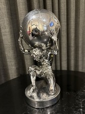 Silver Atlas Figurine Holding