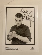ROBBIE WILLIAMS SIGNED PHOTO -