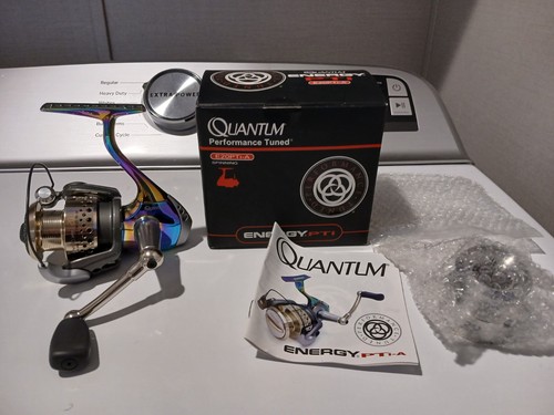 Quantum energy spinning reel - ,