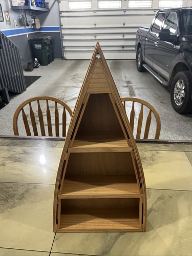 Tall wooden row boat - wooden,