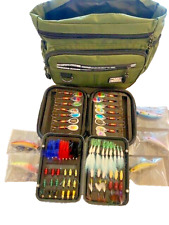 65 flies 5 minnow lures , 16 spinning lures with fishing bag and weighing scale