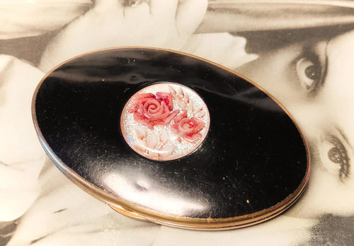 Oval black floral lucite