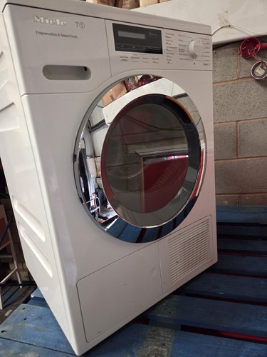 Tumble dryer featuring - tumble,