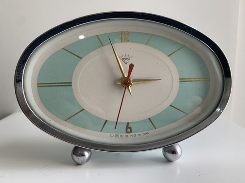 Atomic style oval clock - atomic,