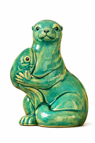 Green ceramic otter holding - green,