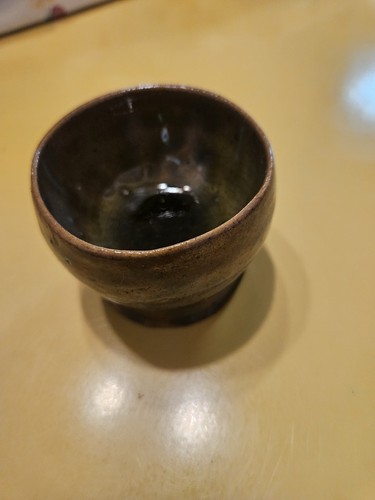 Small brown pottery bowl - small, on
