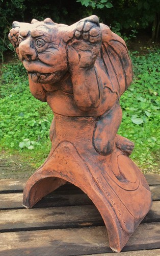 Cheeky tongue gargoyle roof - tongue,