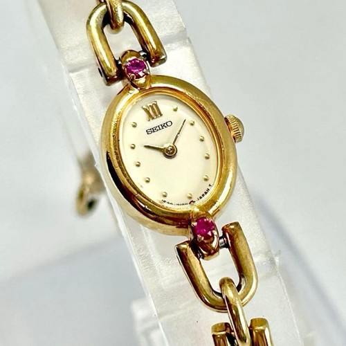 Seiko roman numeral gold - numeral,