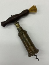antique thomson patented duble helix corkscrew with badge and dusting brush