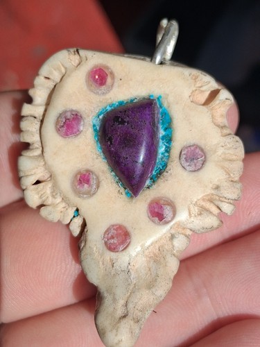 Sugilite red beryl - red, and
