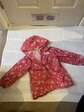 Girls Peppa Pig Coat. Shower