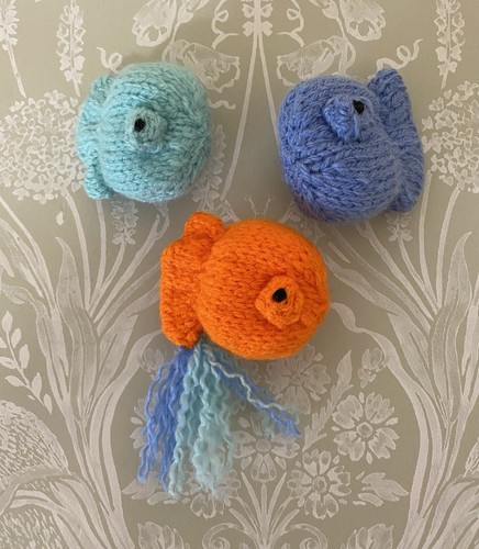 Hand knitted fish soft - hand,