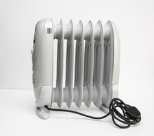 Oil filled heater used - -,
