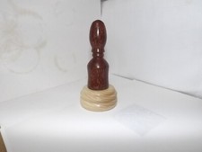 A palm gavel in coconut wood