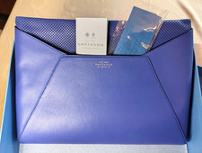 Smythson of Bond Street. Blue perforated leather clutch bag. Original box