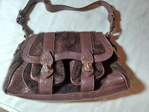 Adorable brown fur and - , leather