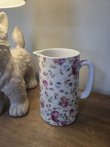 Pint heron cross jug - a,
