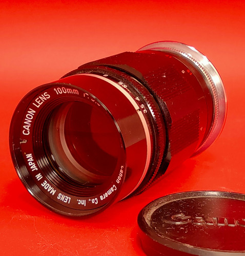 Near mint canon lens - lens, 100mm