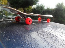Complete skateboard custom Rocket Rasta with Lazer 80's wheels