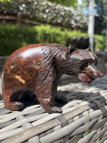 Hand carved wooden grizzly - hand,
